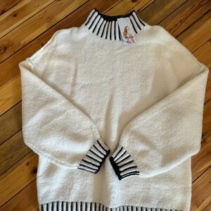 Elegant White and Black Striped Turtleneck Sweater